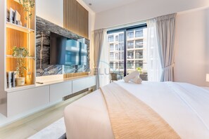 In-room safe, iron/ironing board, free WiFi, bed sheets - Pool and Community View 1BR with Balcony Near Park, Pantheon Elysee II (Dubai)
