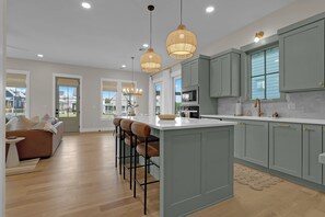 Fridge, microwave, coffee/tea maker, toaster