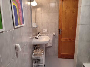 Hair dryer, bidet, towels, soap