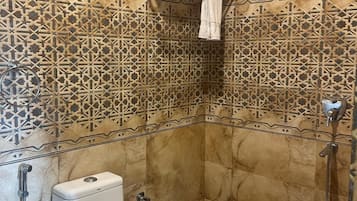 Shower, towels, soap, shampoo