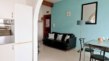 Standard Apartment, Multiple Bedrooms (Seaview Apart 5mn From Sea Xemxija) | Living area | 21-inch TV with cable channels