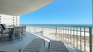 Outdoor dining - New Complex! Beachfront 4BR, PARKING LEVEL!, Lazy River and Slide! (Gulf Shores)