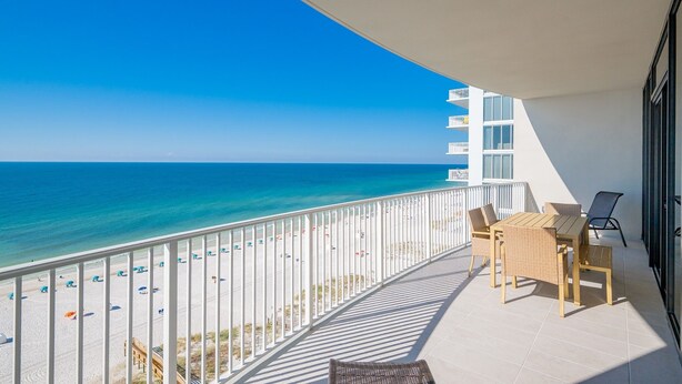 A balcony with a view of the beach and ocean. - Phoenix Gulf Shores Ii 1102 3 Bedroom Condo (Gulf Shores)