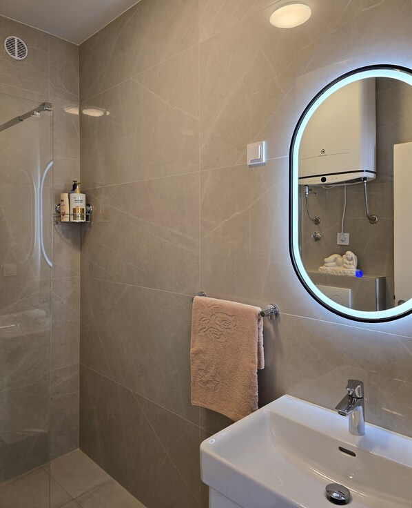 Hair dryer, towels, soap, toilet paper