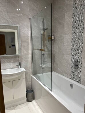 Eco-friendly toiletries, hair dryer, towels
