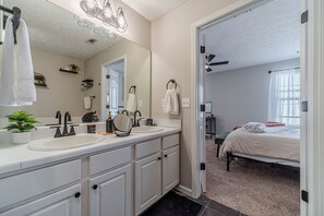 Shower, towels, soap, toilet paper