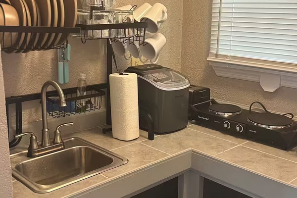 Frigorifero, microonde, macchina per tè/caffè, tostapane