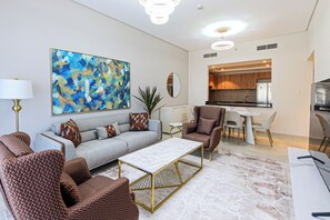 55-inch Smart TV with cable channels - Spacious 2BR Apt Maids Elegance (Dubai)