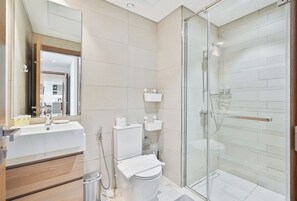 Shower, hair dryer, towels, soap