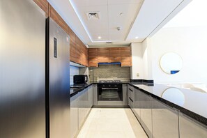 Appartement, balcon, vue ville | Cuisine privée