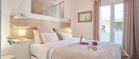 2 habitaciones, tabla de planchar con plancha y cuna de viaje