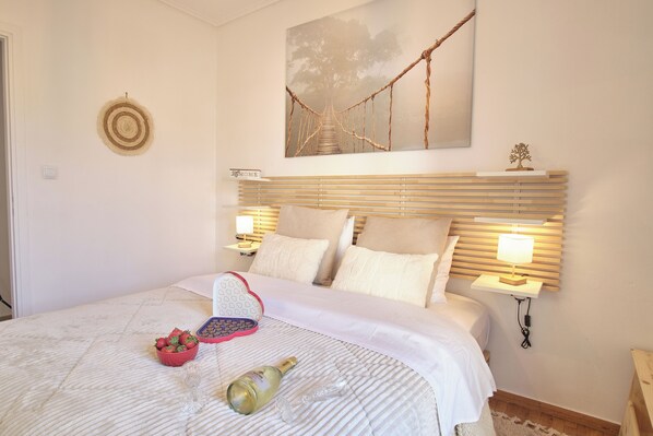 2 bedrooms, iron/ironing board, travel crib, bed sheets