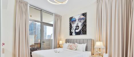 2 chambres, coffres-forts dans les chambres, fer et planche à repasser