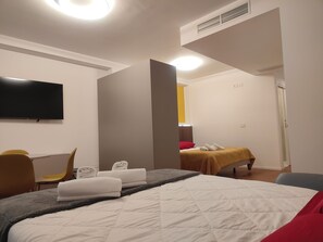 Deluxe kamer, balkon | Woonruimte