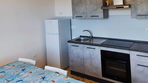 Vila, 6 quartos, para fumantes, varanda | Parte interna