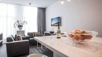 Executive Apartment | Private kitchen | Fridge, microwave, stovetop, coffee/tea maker