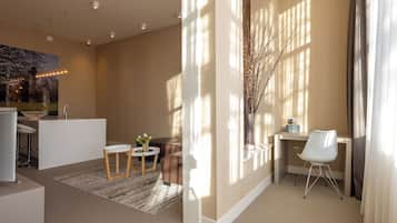 Deluxe Suite, Garden View | 1 bedroom, premium bedding, in-room safe, desk