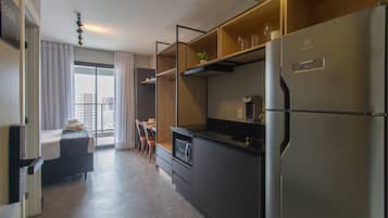 Fridge, microwave, stovetop, coffee/tea maker