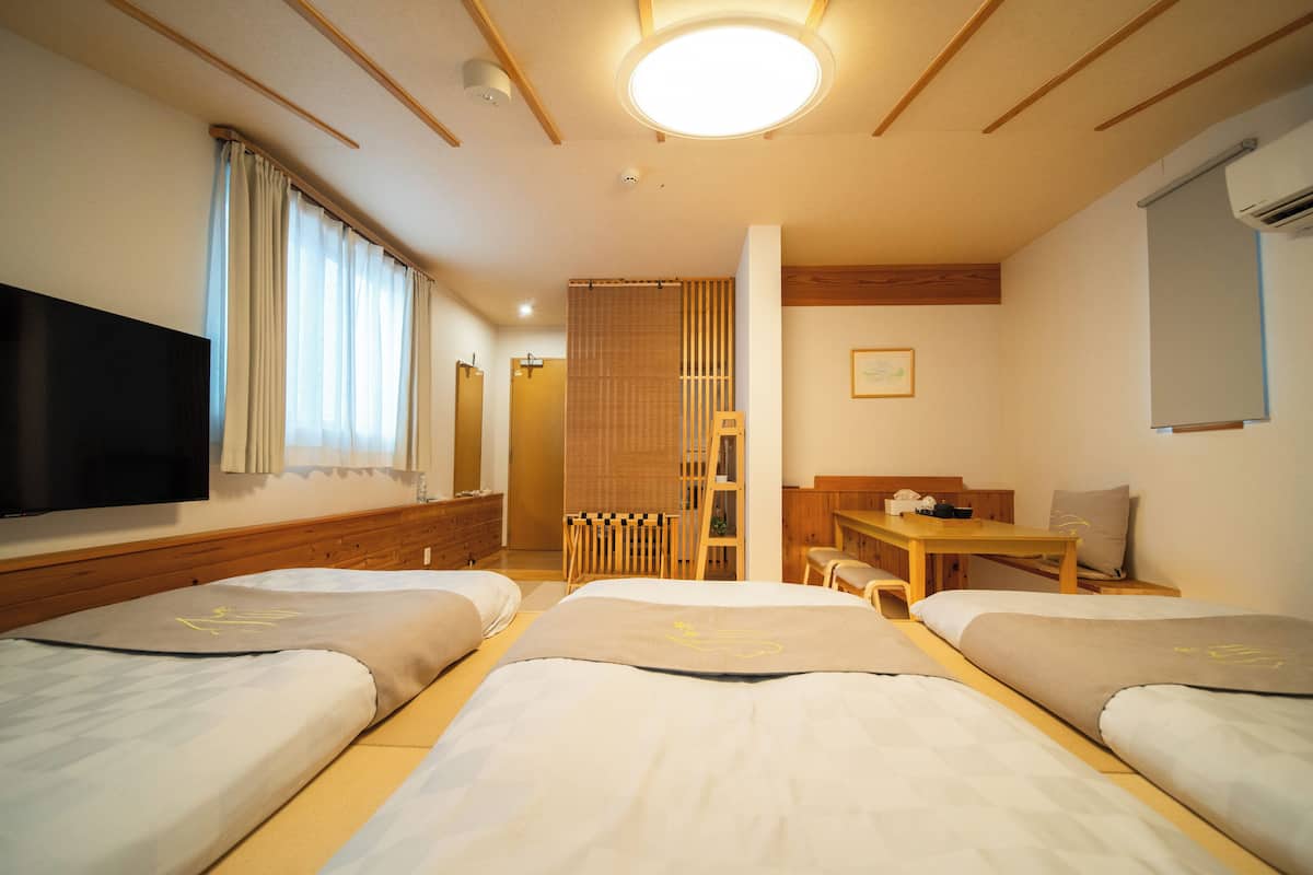 Chambre Quadruple Deluxe