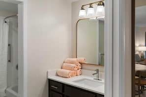 Hair dryer, towels, soap, toilet paper