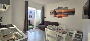 Apartment, 2 Bedrooms, Smoking, Patio | Living area - Casa Lilly With Private Garden (Castelsardo)