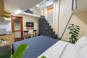 Traditioneel appartement | Een minibar, een bureau, gratis wifi, beddengoed