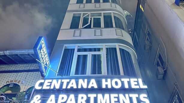 A hotel sign reading "CENTANA HOTEL & APARTMENTS" with a modern architectural design. - Centana Hotel & Apartments (Ho Chi Minh City)