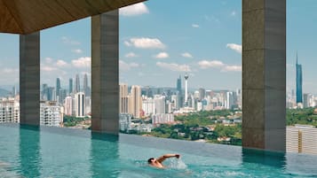 2 outdoor pools, open 7:00 AM to 8:00 PM, lifeguards on site