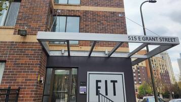 Fitness center at 515 E Grant Street offers a convenient entrance with a glass door.