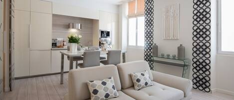 Appartement Deluxe | Coin séjour | Télévision à écran plat