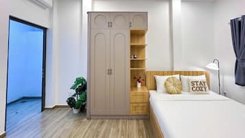 Estudio Deluxe | 1 dormitorio, mobiliario individual, escritorio