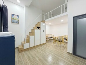 Deluxe Loft | Individually furnished, desk, laptop workspace, blackout drapes - Urbanest Aparthotel - Hello! You're home (Ho Chi Minh City)