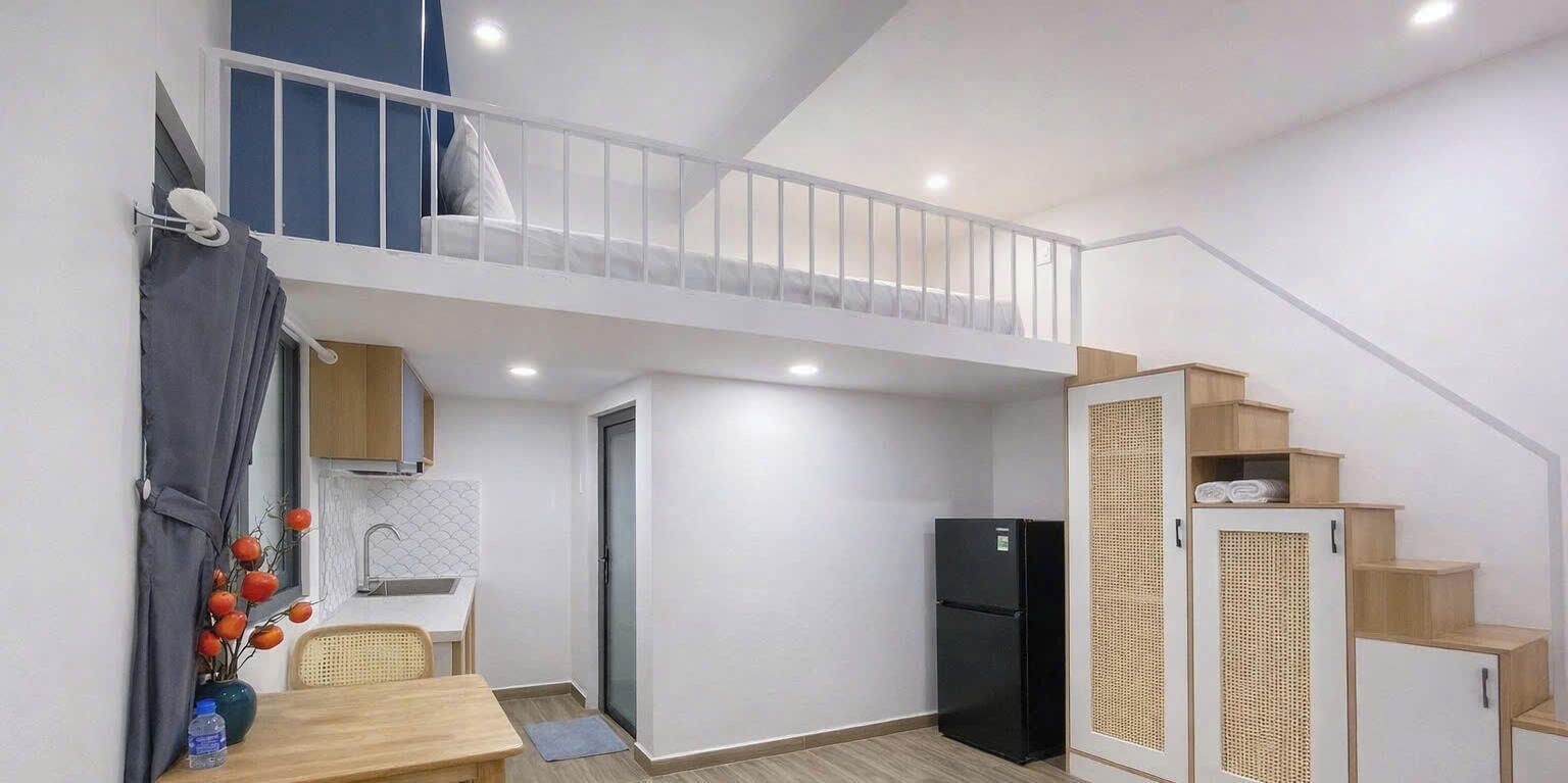 Deluxe-loftsværelse | Individuel indretning, skrivebord, arbejdsområde til bærbare computere