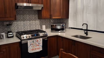 Fridge, microwave, coffee/tea maker, toaster