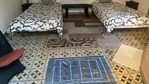 Chambre Confort double ou avec lits jumeaux, patio, vue sur le jardin