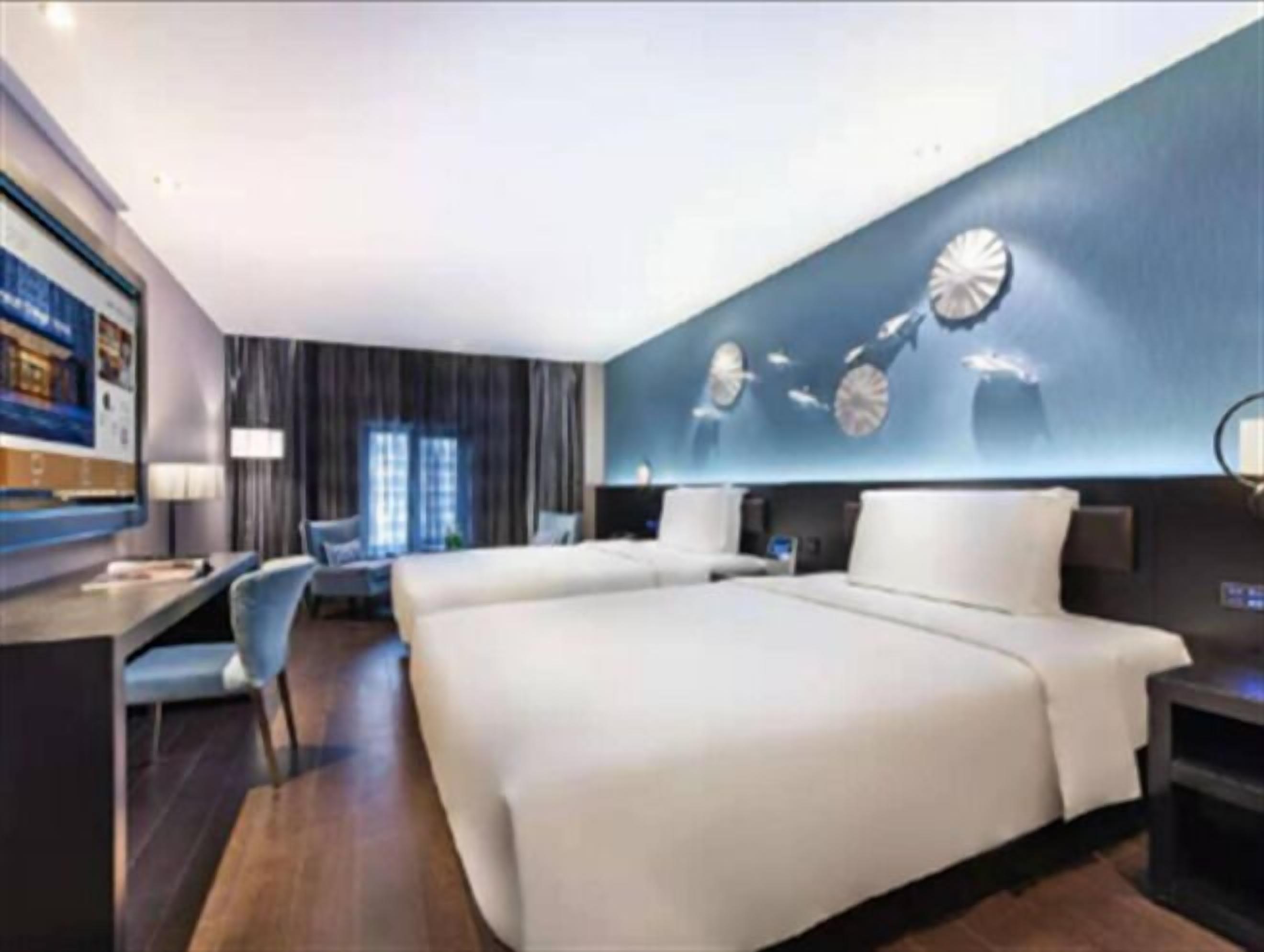 Quarto duplo | Frigobar (abastecido com itens grátis), Wi-Fi de cortesia, roupa de cama
