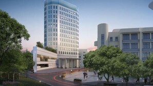 A modern building with a curved facade, a flat-roofed structure, and a spacious plaza with trees and a curved road. - Academic Exchange Center of Central China Normal University (Guiyuan Hotel) (Wuhan)