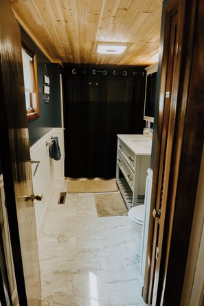 Shower, eco-friendly toiletries, towels, soap