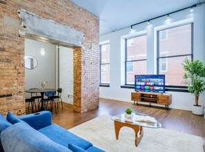 Smart TV, offices - This loft-style one-bedroom apartment in downtown’s Cultural District is ideal for traveling professionals and sports fans. Stay cozy and catch the game—Steelers Stadium is right around the corner. (Pittsburgh)