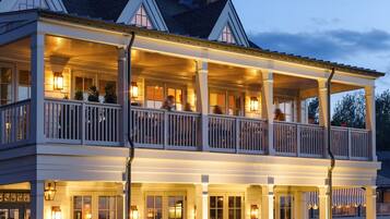 Stunning two-story building with a spacious balcony and symmetrical facade.