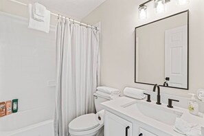 Hair dryer, towels, soap, shampoo