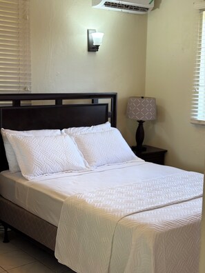 2 dormitorios, tabla de planchar con plancha, wifi gratis y ropa de cama