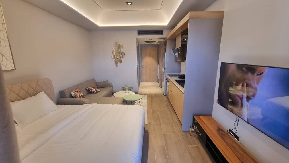 Comfort Studio Suite, City View | Desk, laptop workspace, blackout drapes, iron/ironing board