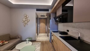 Comfort-Studiosuite, Stadtblick | Wohnbereich