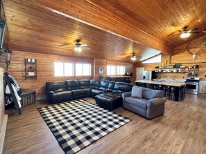 Living area - 4-bedroom apartment right across from rodeo in cody - or rent the whole lodge! (Cody)