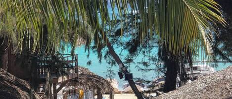On the beach, sun loungers, beach towels