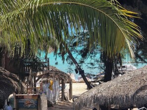 On the beach, sun-loungers, beach towels