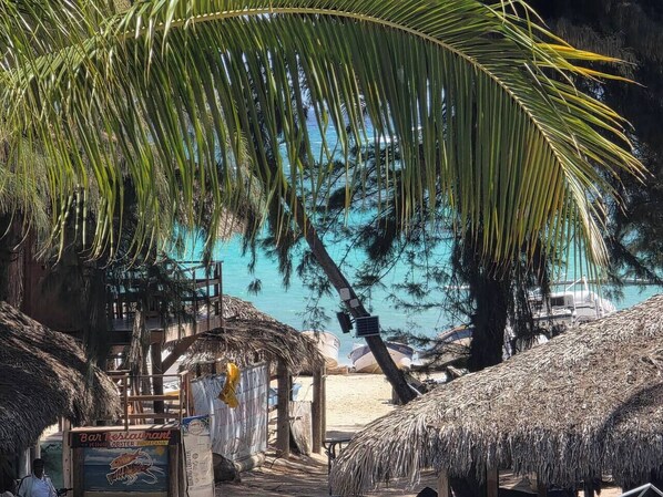 On the beach, sun loungers, beach towels