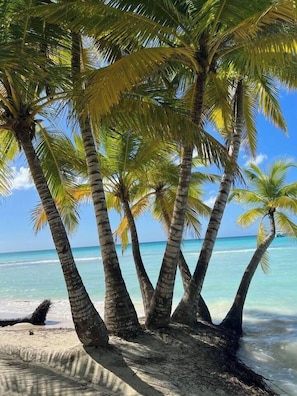 On the beach, sun-loungers, beach towels