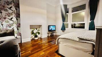 2 habitaciones, tabla de planchar con plancha, wifi y ropa de cama